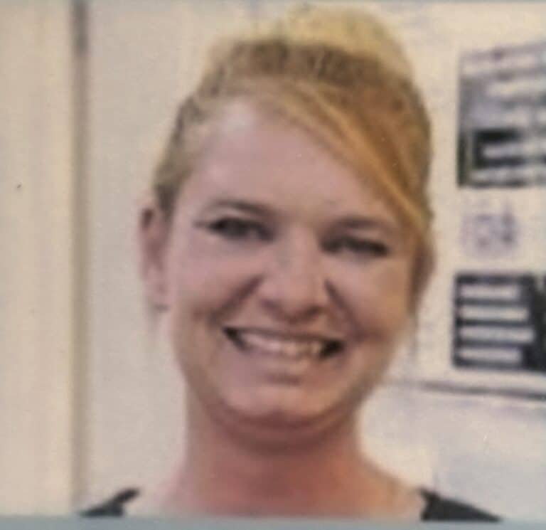 Smiling person in an indoor setting